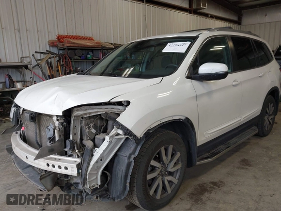 2019 Honda Pilot EX-L with VIN 5FNYF6H54KB043295, listed as a IAAI auction lot 42298547 with 235,343 mi miles and . Bid and sale history available at DreamBid. Image 2.