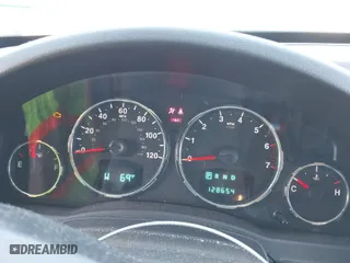 2010 Jeep Liberty Sport with VIN 1J4PN2GK1AW101737, listed as a IAAI auction lot 42003425 with 128,654 mi miles. Bid and sale history available at carsss.com. Image 7.
