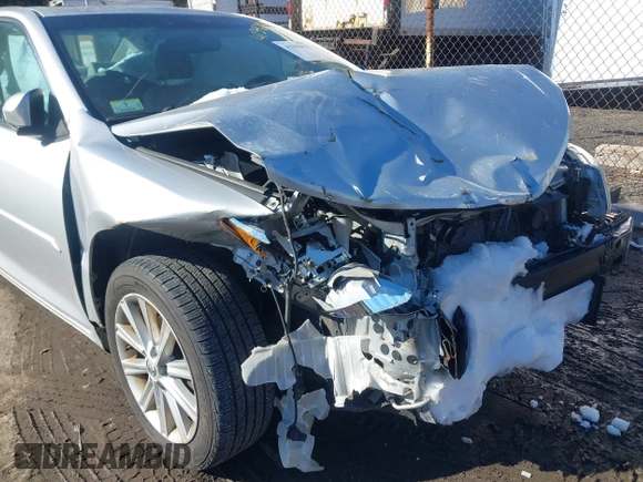 2014 Toyota Camry SE with VIN 4T1BK1FK6EU548176, listed as a IAAI auction lot 41392975 with 143,249 mi miles. Bid and sale history available at carsss.com. Image 6.