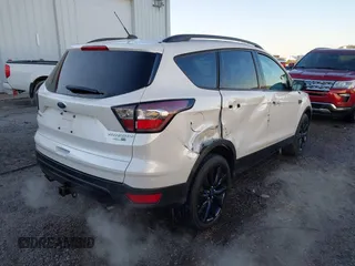 2017 Ford Escape Titanium with VIN 1FMCU9J93HUE96611, listed as a IAAI auction lot 41546906 with 90,586 mi miles. Bid and sale history available at carsss.com. Image 4.