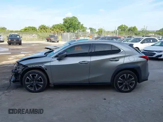 2020 Lexus UX 250h with VIN JTHX9JBHXL2033589, listed as a IAAI auction lot 42113363 with 71,669 mi miles and . Bid and sale history available at DreamBid. Image 14.