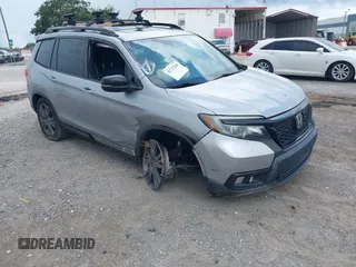 2019 Honda Passport EX-L with VIN 5FNYF7H58KB008121, listed as a IAAI auction lot 42732246 with 100,859 mi miles and . Bid and sale history available at DreamBid. Image 1.