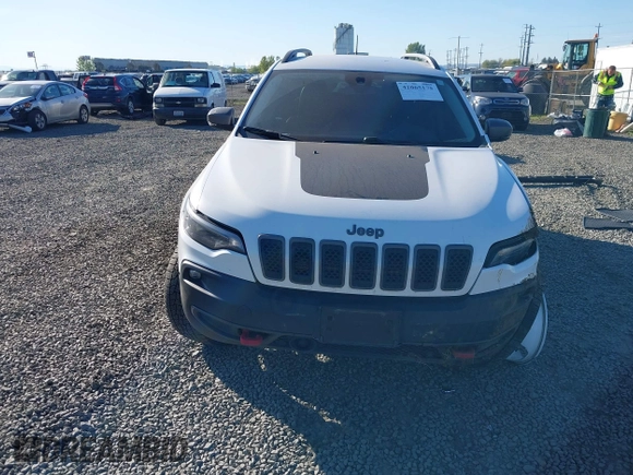 2021 Jeep Cherokee Trailhawk with VIN 1C4PJMBX9MD105888, listed as a IAAI auction lot 42065175 with 55,469 mi miles and . Bid and sale history available at DreamBid. Image 13.