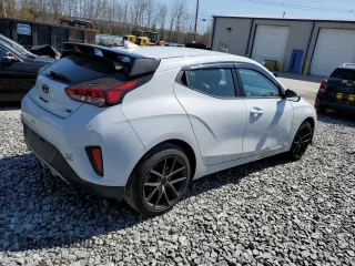 2020 Hyundai Veloster 2.0 с VIN KMHTG6AF7LU027994, выставлен на аукционе Copart как лот 52065775 с пробегом 87 433 миль миль и Списание • Salvage title. История ставок и продаж доступна на DreamBid. Изображение 3.