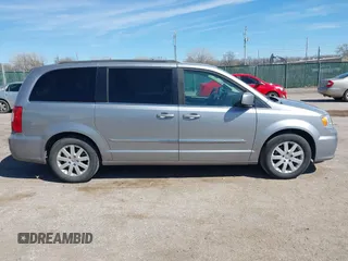 2016 Chrysler Town & Country Touring with VIN 2C4RC1BG7GR157863, listed as a IAAI auction lot 41849422 with 218,936 mi miles and . Bid and sale history available at DreamBid. Image 13.
