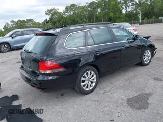 2013 Volkswagen Jetta SportWagen SE with VIN 3VWPX7AJ4DM655174, listed as a IAAI auction lot 42072632 with 65,899 mi miles. Bid and sale history available at carsss.com. Image 4.