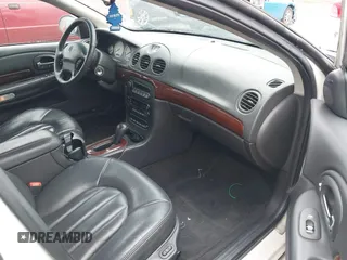 2000 Chrysler LHS with VIN 2C3HC56G4YH382301, listed as a IAAI auction lot 41324699 with 220,076 mi miles and . Bid and sale history available at DreamBid. Image 5.