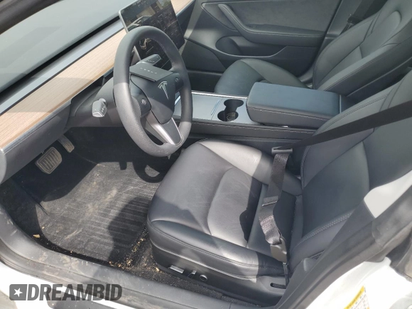 2023 Tesla Model 3 with VIN 5YJ3E1EA0PF575488, listed as a Copart auction lot 56889115 with 18,677 mi miles and Clean title. Bid and sale history available at DreamBid. Image 7.