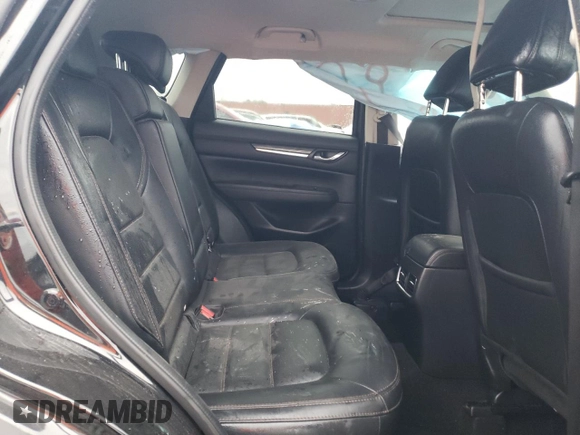 2018 Mazda CX-5 Grand Touring z VIN JM3KFBDM0J0403095, wystawiony jako Copart lot #48594495 z przebiegiem Nie podano mil oraz Szkoda całkowita • Salvage title. Historia ofert i sprzedaży dostępna na DreamBid. Obrazek 10.
