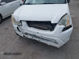 2004 Honda CR-V LX with VIN JHLRD68454C004803, listed as a IAAI auction lot 41910388 with 192,766 mi miles and . Bid and sale history available at carsss.com. Image 6.