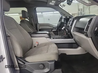 2018 Ford F-150 XL with VIN 1FTEW1E59JKD11351, listed as a IAAI auction lot 42663848 with 128,761 mi miles and . Bid and sale history available at DreamBid. Image 5.