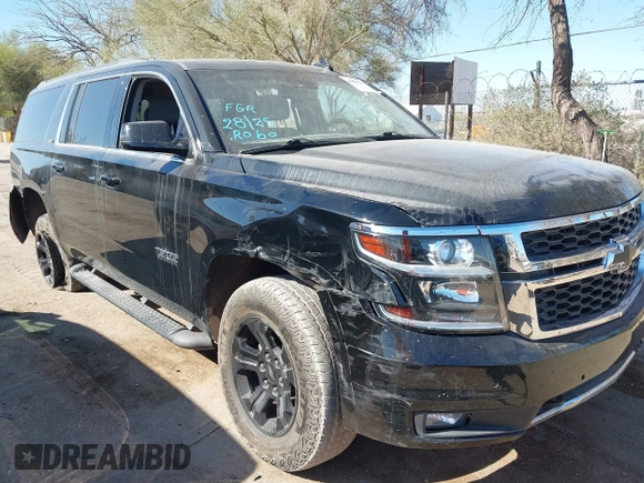 2020 Chevrolet Suburban LT with VIN 1GNSKHKC5LR303081, listed as a IAAI auction lot 41896511 with 60,121 mi miles and . Bid and sale history available at DreamBid. Image 6.