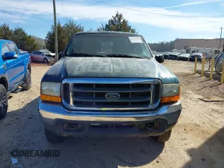 1999 Ford Super Duty F-250 XL with VIN 1FTNW21S2XEE10313, listed as a IAAI auction lot 41825300 with 150,619 mi miles. Bid and sale history available at carsss.com. Image 12.