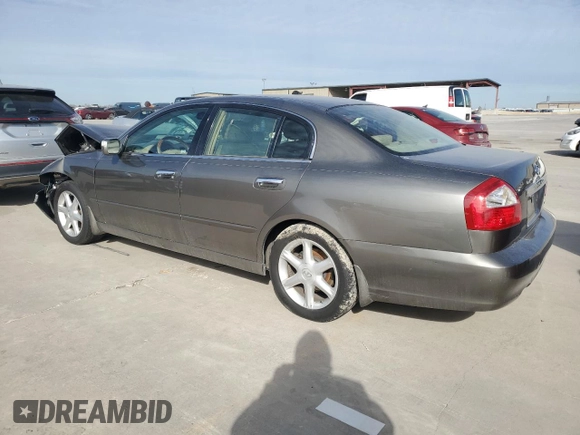 2004 Infiniti Q45 z VIN JNKBF01AX4M500632, wystawiony jako Copart lot #87741405 z przebiegiem 188 505 mil mil oraz Szkoda całkowita • Salvage title. Historia ofert i sprzedaży dostępna na DreamBid. Obrazek 2.