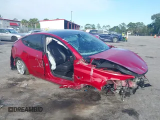 2021 Tesla Model Y Long Range z VIN 5YJYGAEE3MF184396, wystawiony jako IAAI lot #42321116 z przebiegiem Nie podano mil oraz . Historia ofert i sprzedaży dostępna na DreamBid. Obrazek 1.