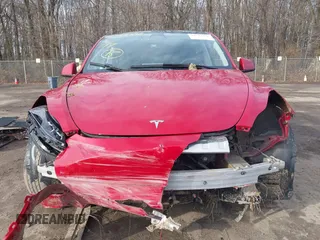 2023 Tesla Model Y Long Range with VIN 7SAYGDEE7PF672887, listed as a IAAI auction lot 41744398 with Not Provided miles. Bid and sale history available at carsss.com. Image 11.
