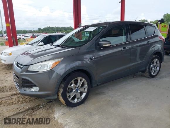 2013 Ford Escape SEL with VIN 1FMCU0HX8DUB61208, listed as a IAAI auction lot 42575283 with 140,330 mi miles and . Bid and sale history available at DreamBid. Image 2.