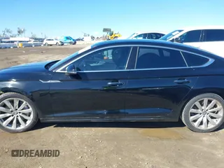 2018 Audi A5 Sportback Premium z VIN WAUANCF53JA009200, wystawiony jako IAAI lot #41725501 z przebiegiem 107 076 mil mil oraz . Historia ofert i sprzedaży dostępna na DreamBid. Obrazek 15.