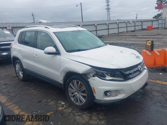 2012 Volkswagen Tiguan SEL with VIN WVGAV7AX0CW507942, listed as a IAAI auction lot 41854498 with 177,117 mi miles and . Bid and sale history available at DreamBid. Image 1.