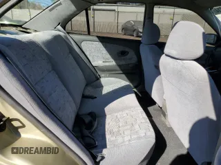 1997 Mitsubishi Mirage z VIN JA3AY36A9VU027615, wystawiony jako Copart lot #77401214 z przebiegiem 104 407 mil mil oraz Szkoda całkowita • Salvage title. Historia ofert i sprzedaży dostępna na DreamBid. Obrazek 10.