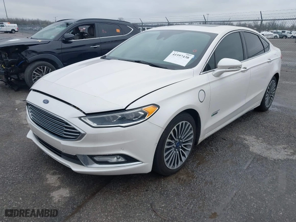 2017 Ford Fusion Energi Titanium with VIN 3FA6P0SU7HR191665, listed as a IAAI auction lot 41597438 with 166,570 mi miles. Bid and sale history available at carsss.com. Image 17.