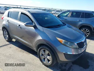 2013 Kia Sportage LX with VIN KNDPB3A2XD7406973, listed as a IAAI auction lot 41740511 with 192,613 mi miles. Bid and sale history available at carsss.com. Image 1.