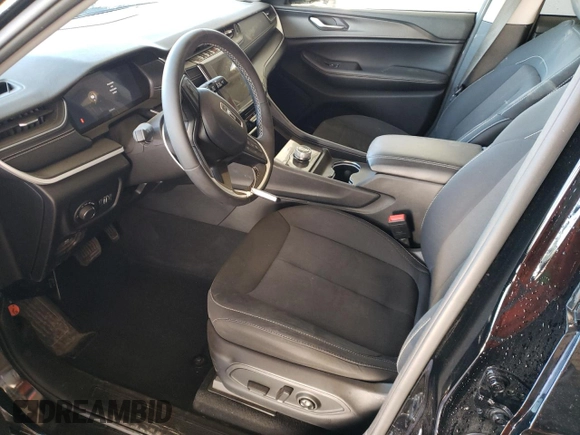 2024 Jeep Grand Cherokee Laredo with VIN 1C4RJHAG0RC700496, listed as a Copart auction lot 88449625 with 32,049 mi miles and Clean title. Bid and sale history available at DreamBid. Image 7.
