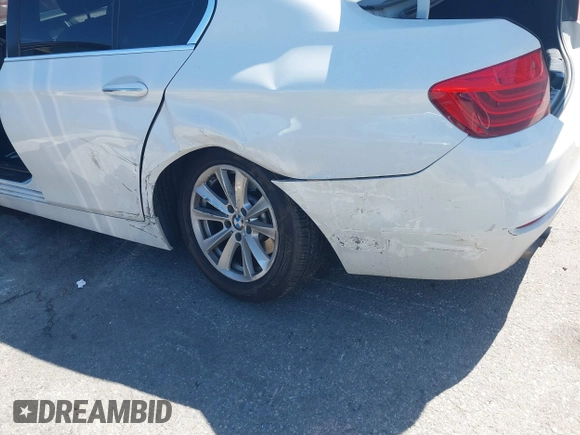 2014 BMW 5 Series 528i with VIN WBA5A5C55ED500014, listed as a IAAI auction lot 41835309 with 114,436 mi miles and . Bid and sale history available at DreamBid. Image 6.