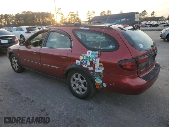 2001 Mercury Sable LS Premium with VIN 1MEHM59S91A635138, listed as a Copart auction lot 84674814 with 170,559 mi miles and Salvage Title. Bid and sale history available at DreamBid. Image 2.