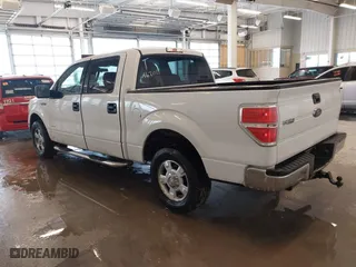 2013 Ford F-150 XL with VIN 1FTFW1CTXDFA62013, listed as a IAAI auction lot 41645531 with 185,555 mi miles. Bid and sale history available at carsss.com. Image 3.