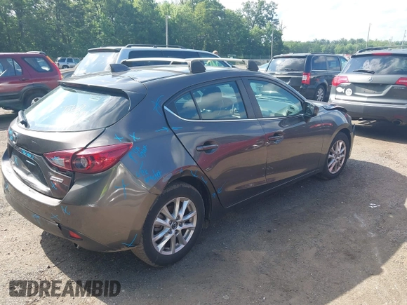 2015 Mazda 3 i Grand Touring with VIN 3MZBM1M75FM189340, listed as a IAAI auction lot 42654822 with 145,697 mi miles and . Bid and sale history available at DreamBid. Image 4.