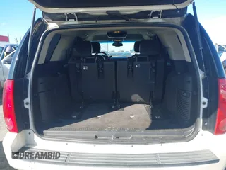 2014 GMC Yukon SLT with VIN 1GKS1CE01ER179379, listed as a IAAI auction lot 41717271 with 136,999 mi miles. Bid and sale history available at carsss.com. Image 16.