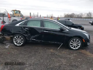 2015 Cadillac XTS Luxury with VIN 2G61M5S38F9138545, listed as a IAAI auction lot 41690696 with 136,460 mi miles and . Bid and sale history available at DreamBid. Image 13.