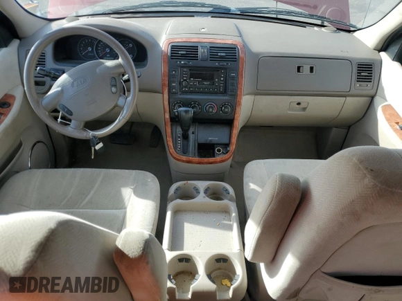 2004 Kia Sedona LX with VIN KNDUP131546612432, listed as a Copart auction lot 87326764 with 156,259 mi miles and Salvage Title. Bid and sale history available at carsss.com. Image 8.