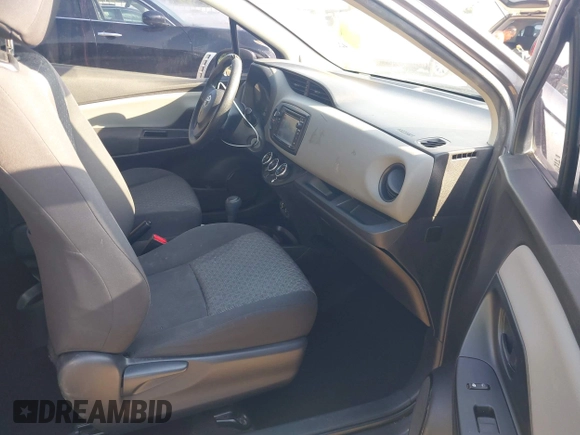 2015 Toyota Yaris L with VIN VNKJTUD35FA054329, listed as a IAAI auction lot 42289132 with 122,257 mi miles and . Bid and sale history available at DreamBid. Image 5.