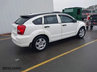 2008 Dodge Caliber SE with VIN 1B3HB28B18D782460, listed as a IAAI auction lot 41559904 with 167,195 mi miles. Bid and sale history available at carsss.com. Image 4.