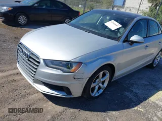 2015 Audi A3 Premium z VIN WAUACGFFXF1005724, wystawiony jako IAAI lot #41745687 z przebiegiem 109 751 mil mil oraz . Historia ofert i sprzedaży dostępna na DreamBid. Obrazek 6.