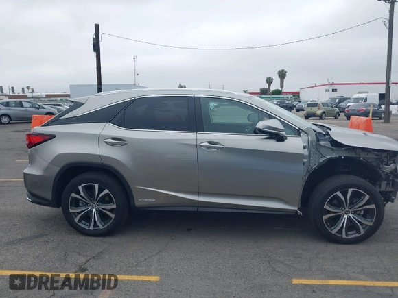 2021 Lexus RX 450h with VIN 2T2HGMDA3MC060208, listed as a IAAI auction lot 42163455 with 34,167 mi miles and . Bid and sale history available at DreamBid. Image 14.