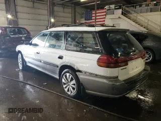 1999 Subaru Legacy Outback with VIN 4S3BG6853X7651034, listed as a Copart auction lot 85968574 with 201,205 mi miles and Salvage title. Bid and sale history available at DreamBid. Image 2.