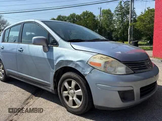 2009 Nissan Versa S with VIN 3N1BC13E99L412868, listed as a Copart auction lot 55990665 with 214,080 mi miles and Clean Title. Bid and sale history available at DreamBid. Image 1.