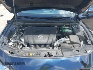 2021 Mazda 3 S z VIN JM1BPAAL6M1331460, wystawiony jako IAAI lot #42197743 z przebiegiem 53 972 mil mil oraz . Historia ofert i sprzedaży dostępna na DreamBid. Obrazek 10.