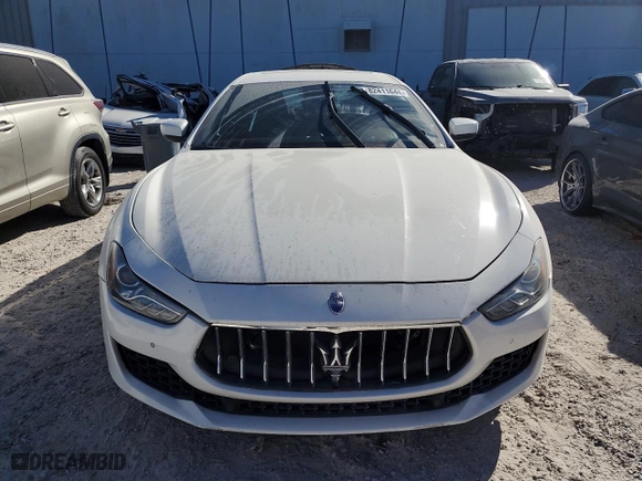 2018 Maserati Ghibli with VIN ZAM57XSA4J1295191, listed as a Copart auction lot 82411644 with NaN miles and Salvage Title. Bid and sale history available at carsss.com. Image 5.