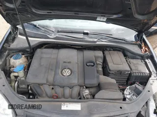 2010 Volkswagen Jetta Sedan S with VIN 3VWJZ7AJ2AM060044, listed as a IAAI auction lot 42023971 with 106,228 mi miles. Bid and sale history available at carsss.com. Image 10.