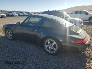 1996 Porsche 911 with VIN WP0DA2996TS385231, listed as a Copart auction lot 83699964 with 60,492 mi miles and Salvage title. Bid and sale history available at DreamBid. Image 2.