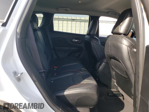 2022 Jeep Cherokee Trailhawk с VIN 1C4PJMBX3ND549057, выставлен на аукционе Copart как лот 48959915 с пробегом 21 381 миль миль и Списание • Salvage title. История ставок и продаж доступна на DreamBid. Изображение 11.