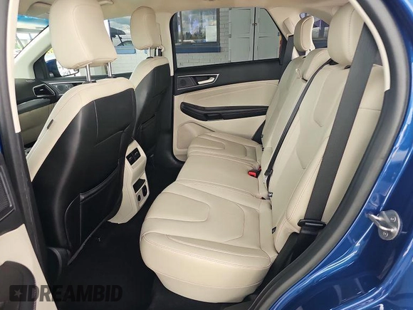 2021 Ford Edge Titanium with VIN 2FMPK3K98MBA53776, listed as a IAAI auction lot 42785493 with 114,856 mi miles and . Bid and sale history available at DreamBid. Image 16.