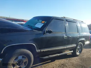 1996 Chevrolet Tahoe with VIN 1GNEK13RXTJ418622, listed as a IAAI auction lot 41879760 with 349,211 mi miles. Bid and sale history available at carsss.com. Image 14.