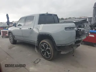 2022 Rivian R1T Adventure z VIN 7FCTGAAA0NN014488, wystawiony jako Copart lot #51024514 z przebiegiem 18 721 mil mil oraz Szkody całkowita. Historia ofert i sprzedaży dostępna na DreamBid. Obrazek 2.