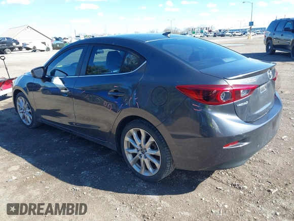 2014 Mazda 3 S Touring with VIN JM1BM1V37E1144331, listed as a IAAI auction lot 41880673 with 102,963 mi miles and . Bid and sale history available at DreamBid. Image 3.