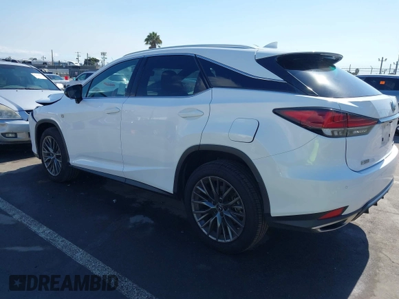 2021 Lexus RX with VIN 2T2SZMDA8MC289158, listed as a IAAI auction lot 41403874 with 84,981 mi miles. Bid and sale history available at carsss.com. Image 3.